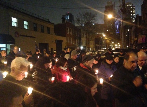 Candlelight vigil outside police precinct