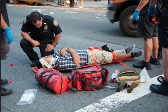 Injured cyclist in Sunnyside in 2012 (allegedly riding against traffic)